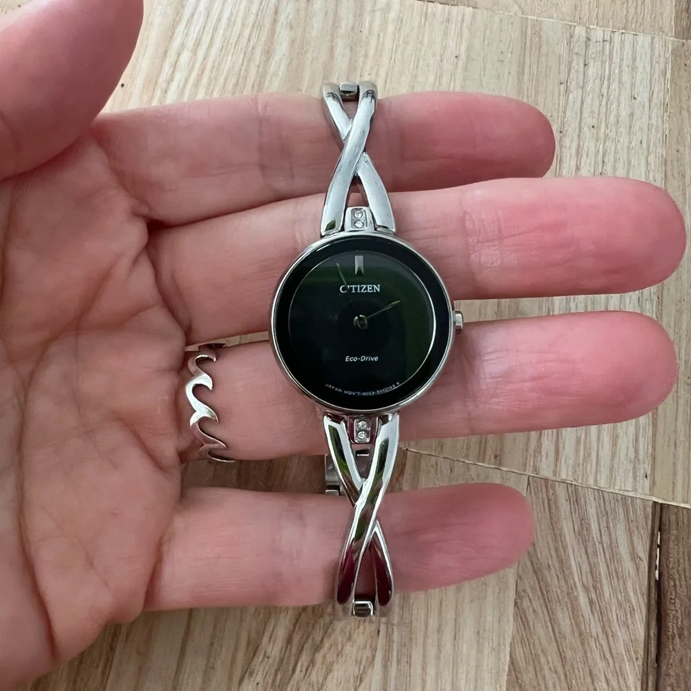Citizen eco-drive ladies black dial silver tone solar powered dress watch